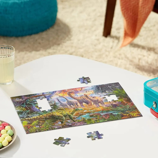 Puzzle Dinozaury 2x60 + 2x100 Schmidt Spiele w Metalowej Walizce